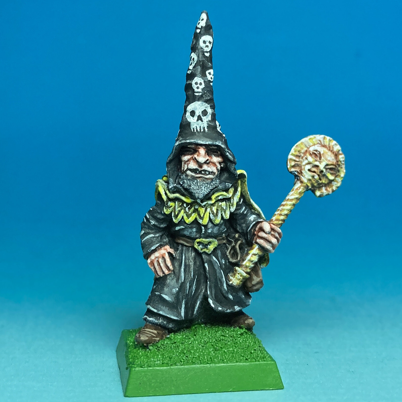 Wizard in Hood with Magical Staff